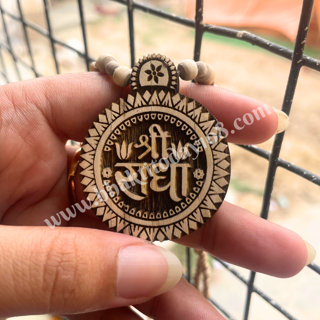 Shri Radha Tulsi Necklace featuring sacred Tulsi beads and a Radha name pendant, symbolizing devotion and divine grace in Vaishnava tradition.